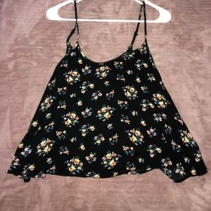 Flowy tank with open back